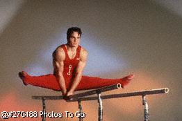 Gymnast on parallel bars